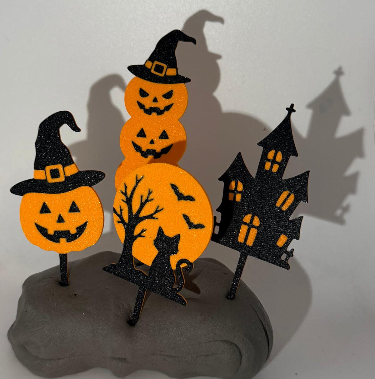 Halloween pumpkin and haunted house cake toppers