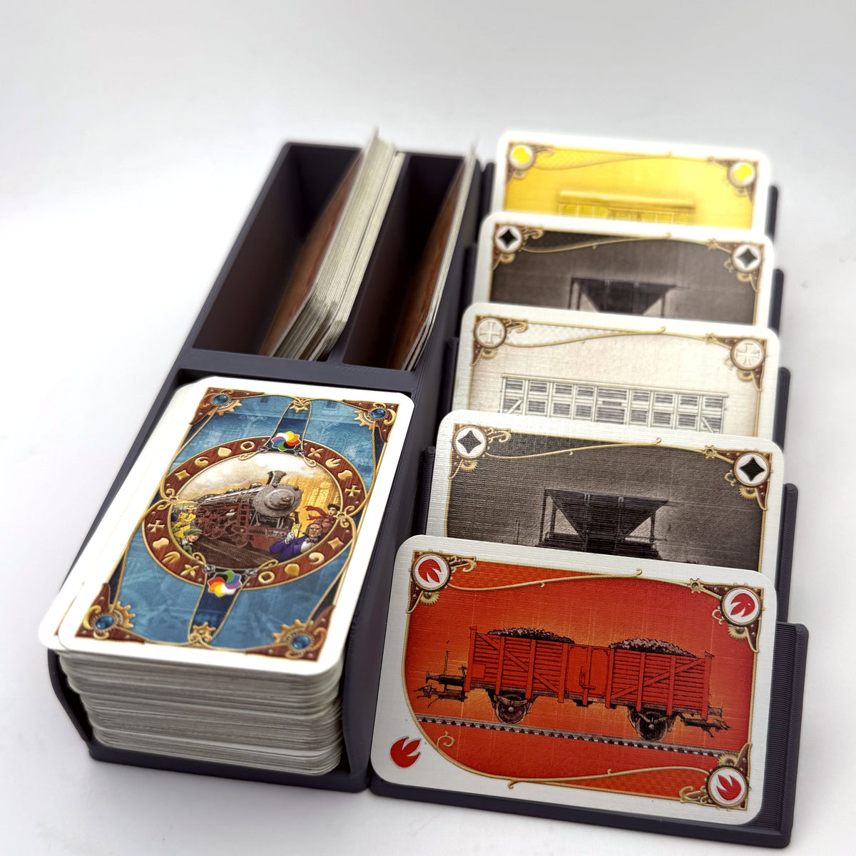 Small card organiser in grey, loaded with a draw deck, face-up display cards and destination tickets - compatible with Ticket to Ride
