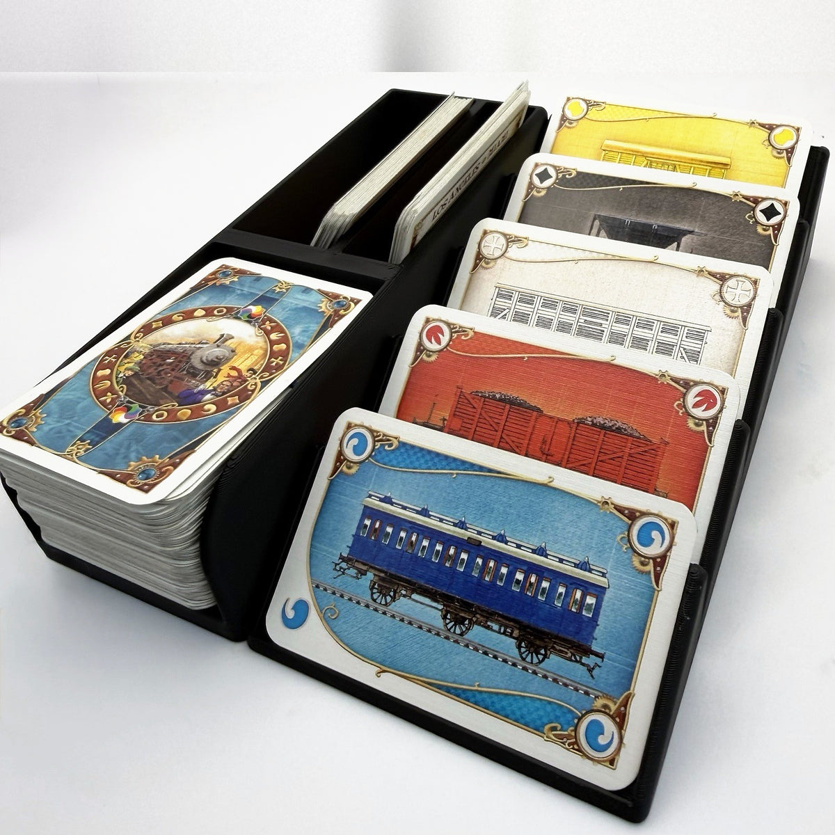 Small card organiser in black with white train inlays, loaded with cards - compatible with Ticket to Ride