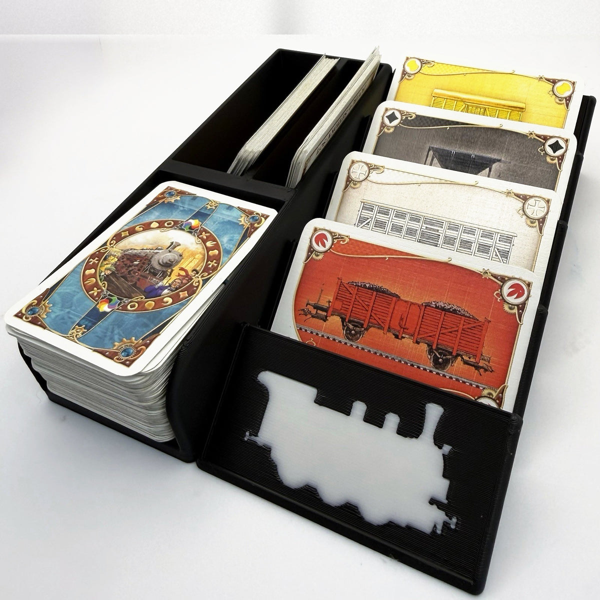 Small card organiser in black, loaded, front slot empty showing the white train silhouette - compatible with Ticket to Ride