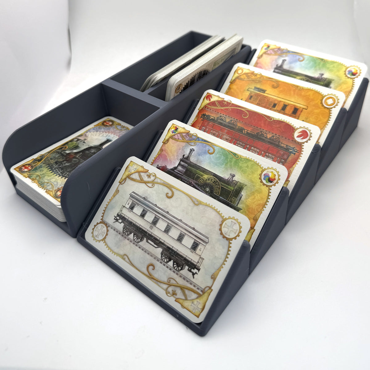 Large card organiser in grey, loaded with large cards, angled view - compatible with Ticket to Ride
