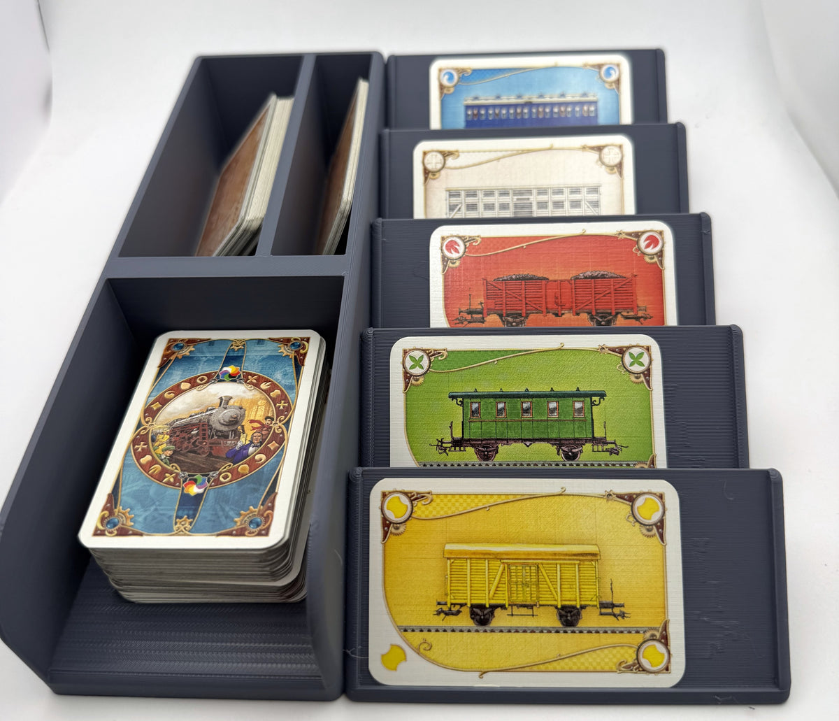Large card organiser in grey, front view, holding a draw deck, display cards and destination tickets - compatible with Ticket to Ride