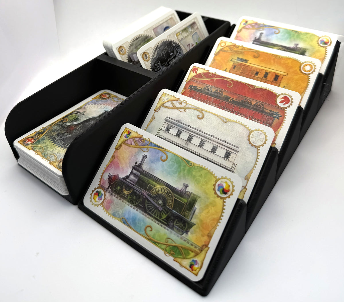 Large card organiser in black with white train inlays, loaded with large cards, angled - compatible with Ticket to Ride