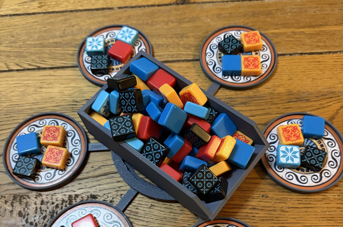 Size and scale view: Discard Tray resting on the central ring with Factory Display Holders around it, shown with Azul tiles (not included) for scale
