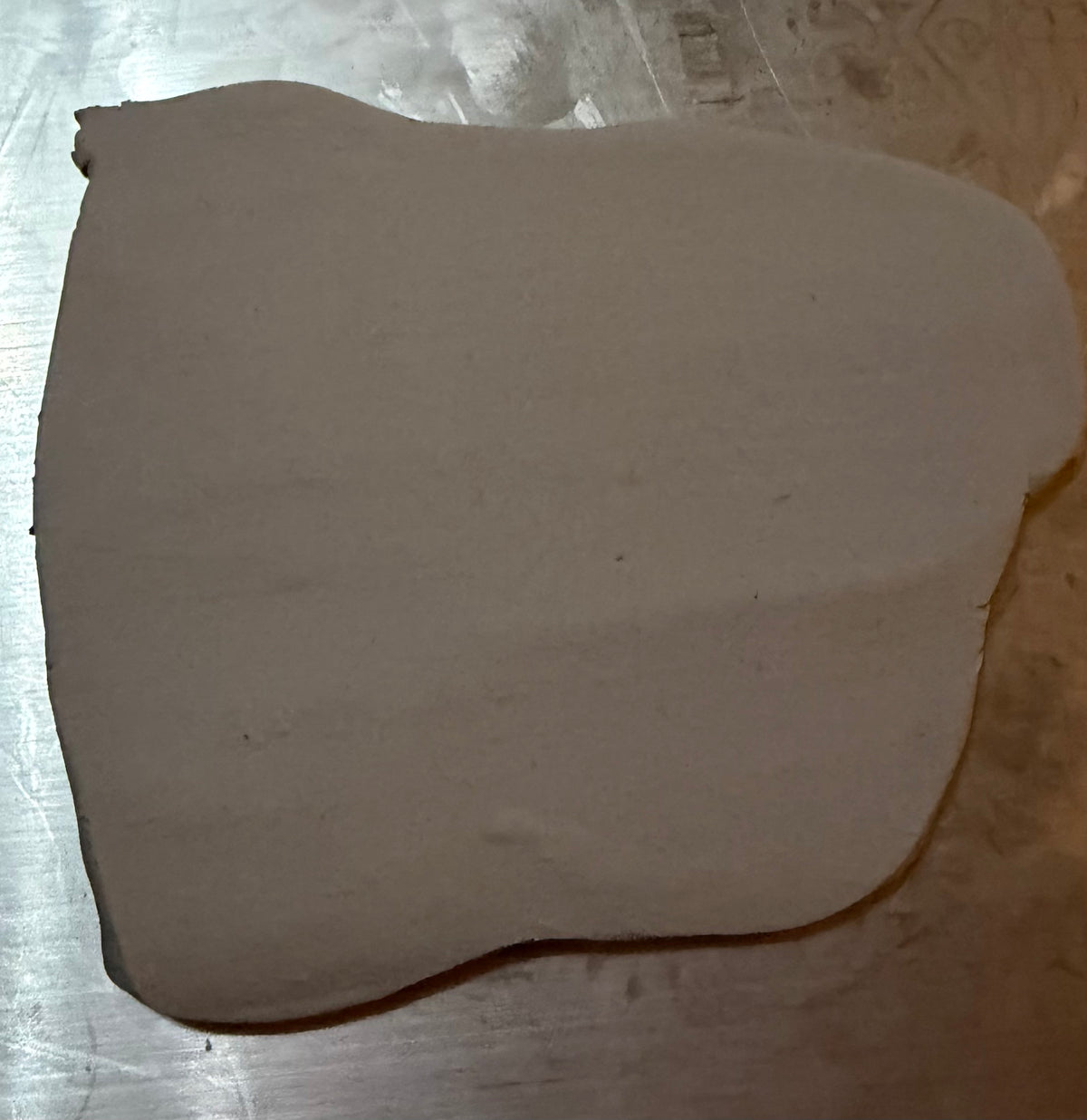 Plain rolled modelling clay ready to texture