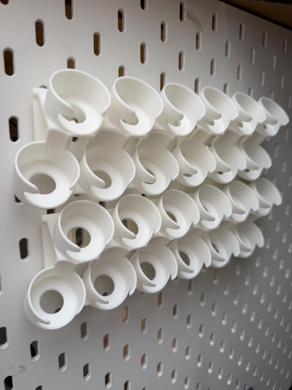 White staggered Citadel paint pot holders for IKEA SKÅDIS - empty multi-holder view