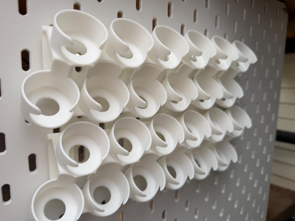 White staggered Citadel paint pot holders for IKEA SKÅDIS - four holders empty
