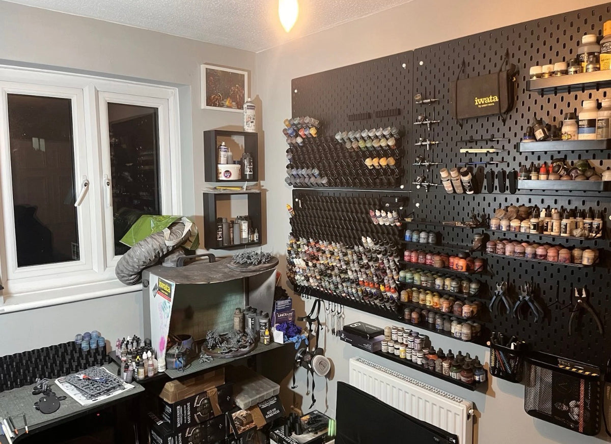 Customer hobby room with SKÅDIS dropper bottle paint storage wall
