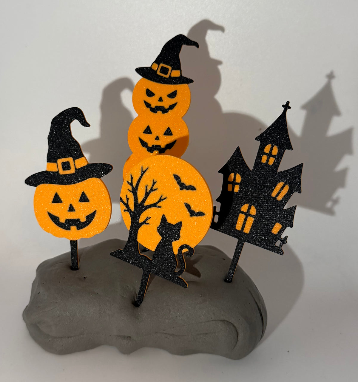 Orange and black Halloween cake topper detail