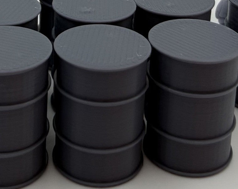 Close view of industrial fuel drum lids and ribbed sides