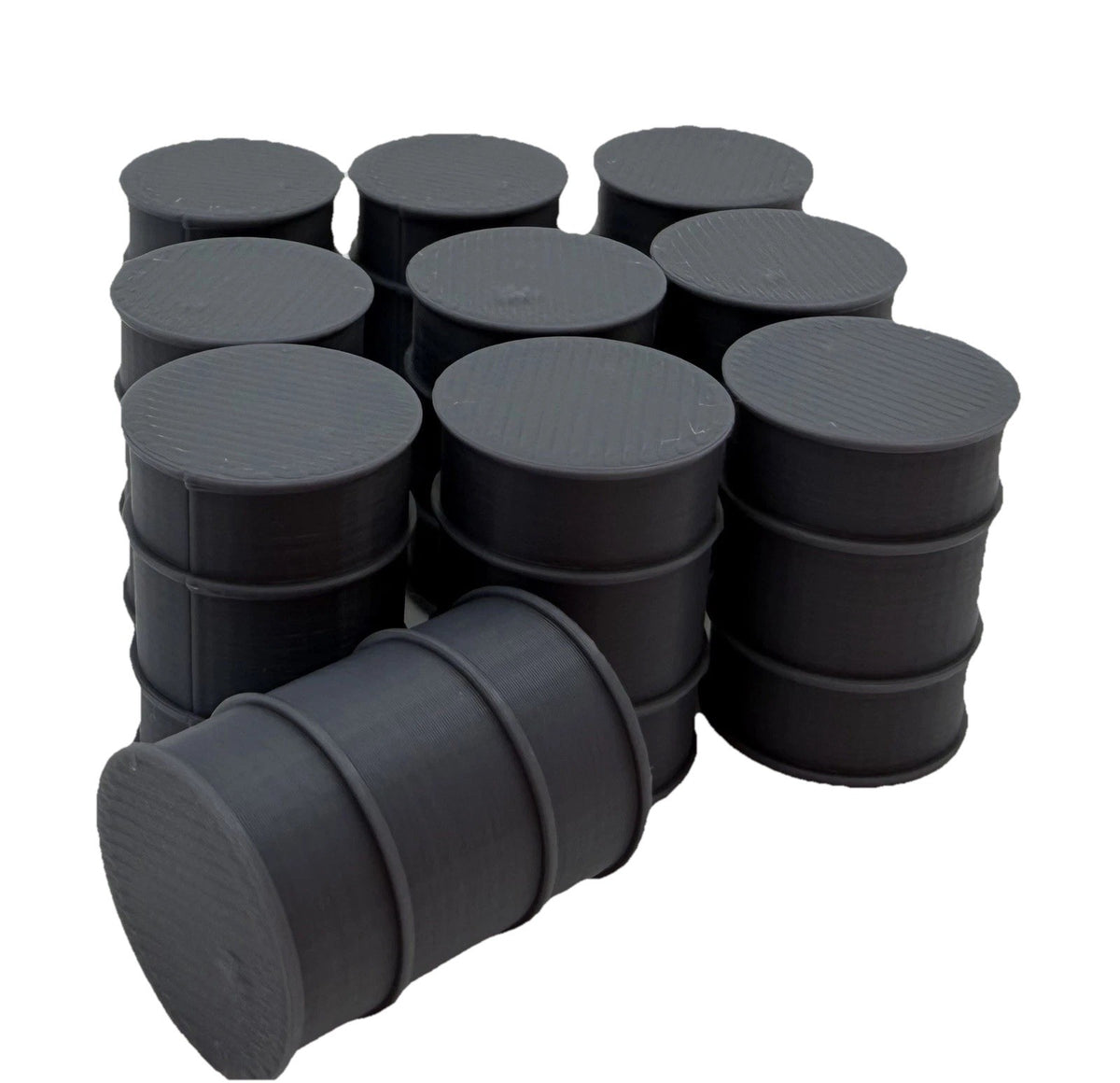 Group of industrial fuel drums arranged as scatter terrain