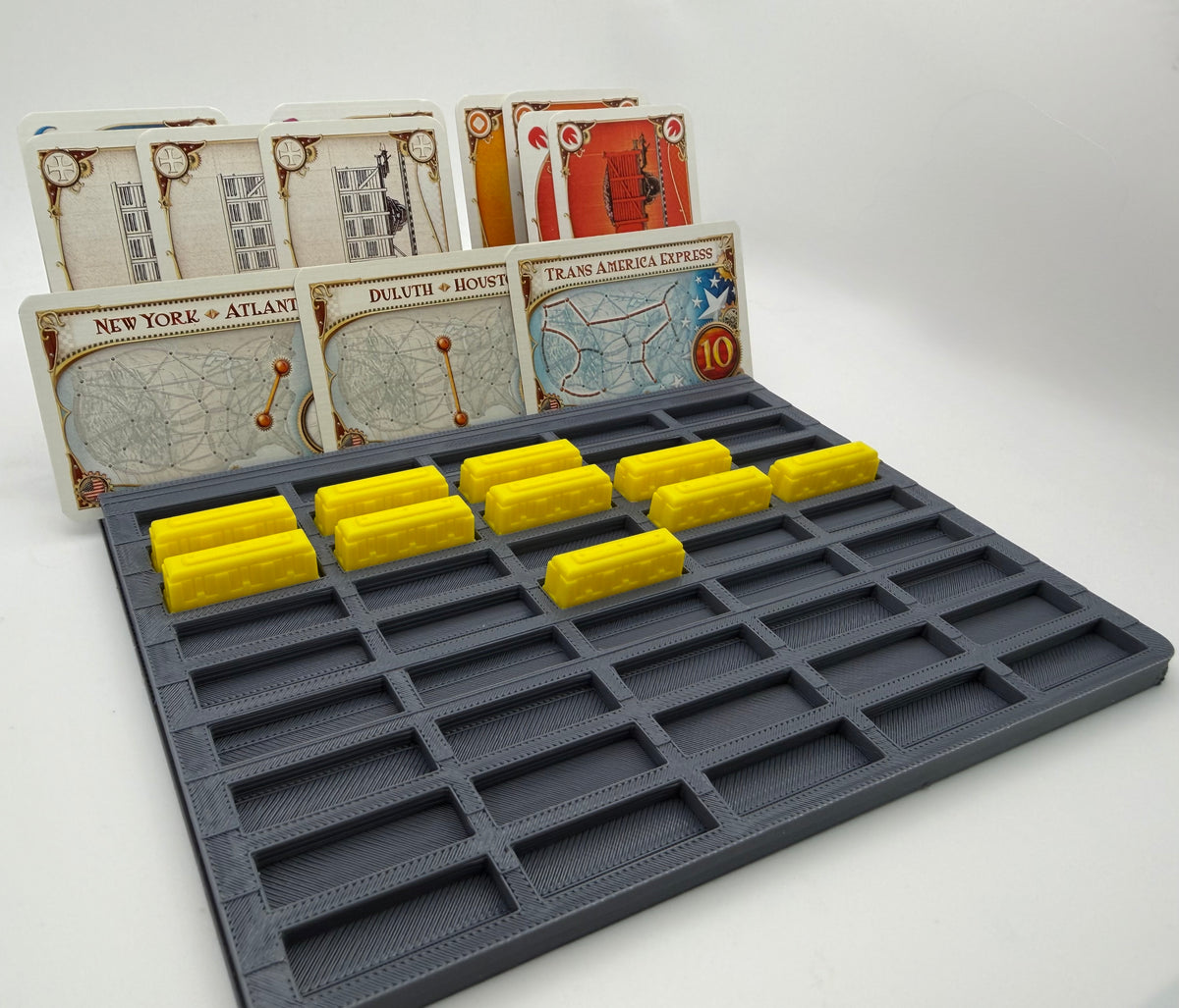 Grey individual-slot player tray