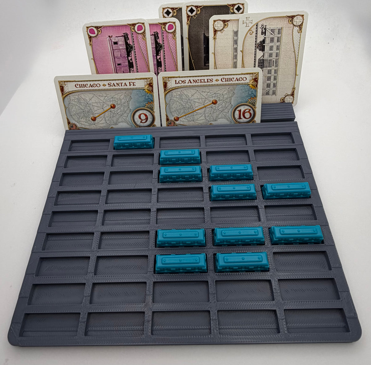 Grey individual-slot player tray