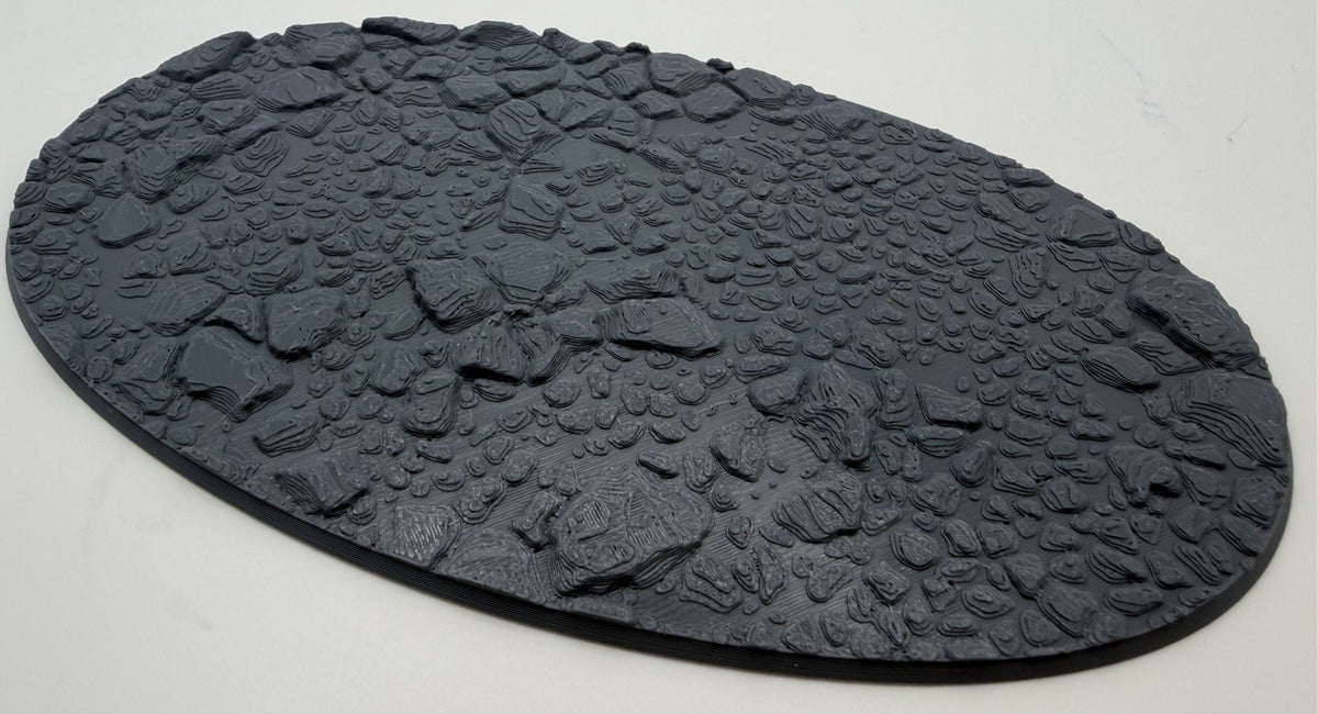 Rocky desert oval scenic base with cracked stone texture, angled view