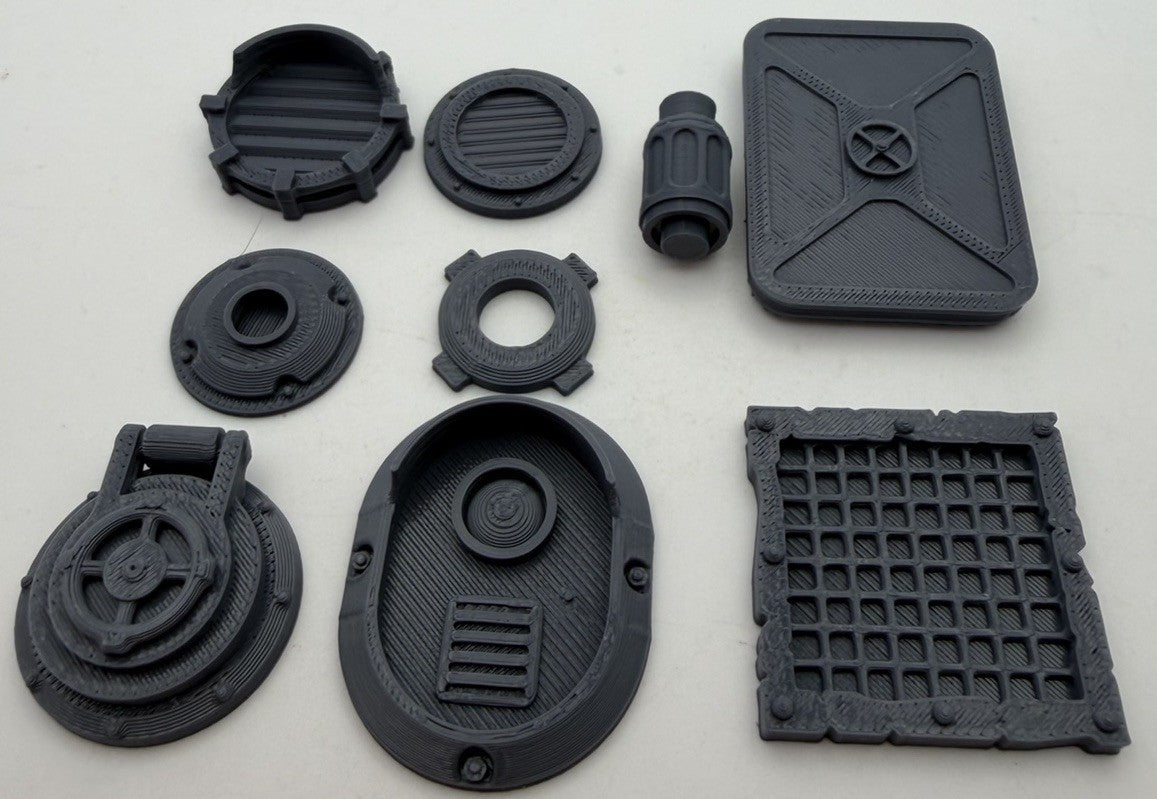 Scrap industrial greebles with round hatches and a grille panel
