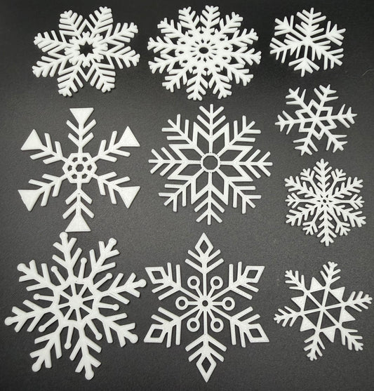 Mixed set of white 3D printed snowflake wall decorations
