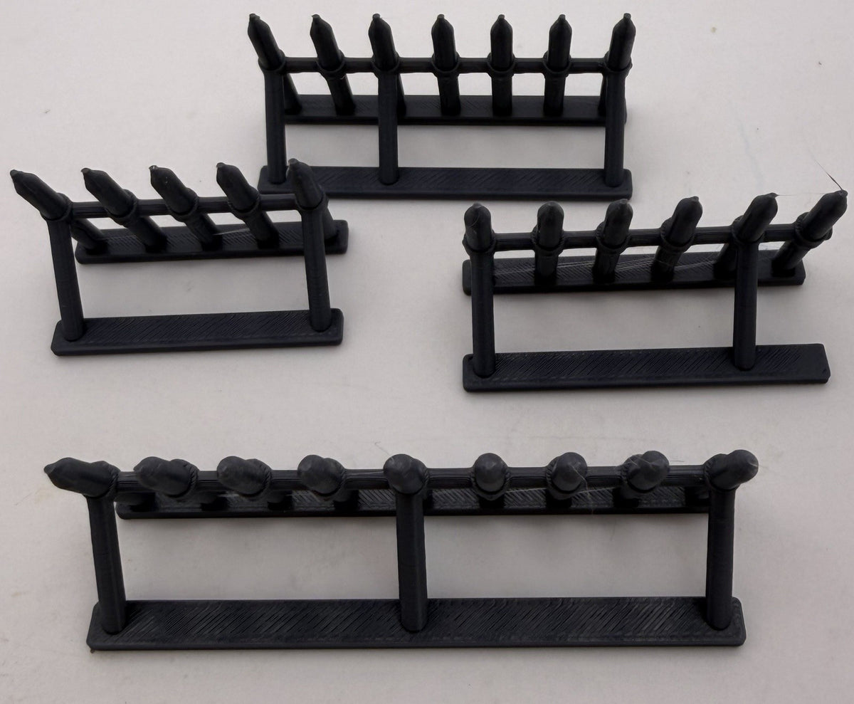 Set of 4 spiked barricades laid out to show each length