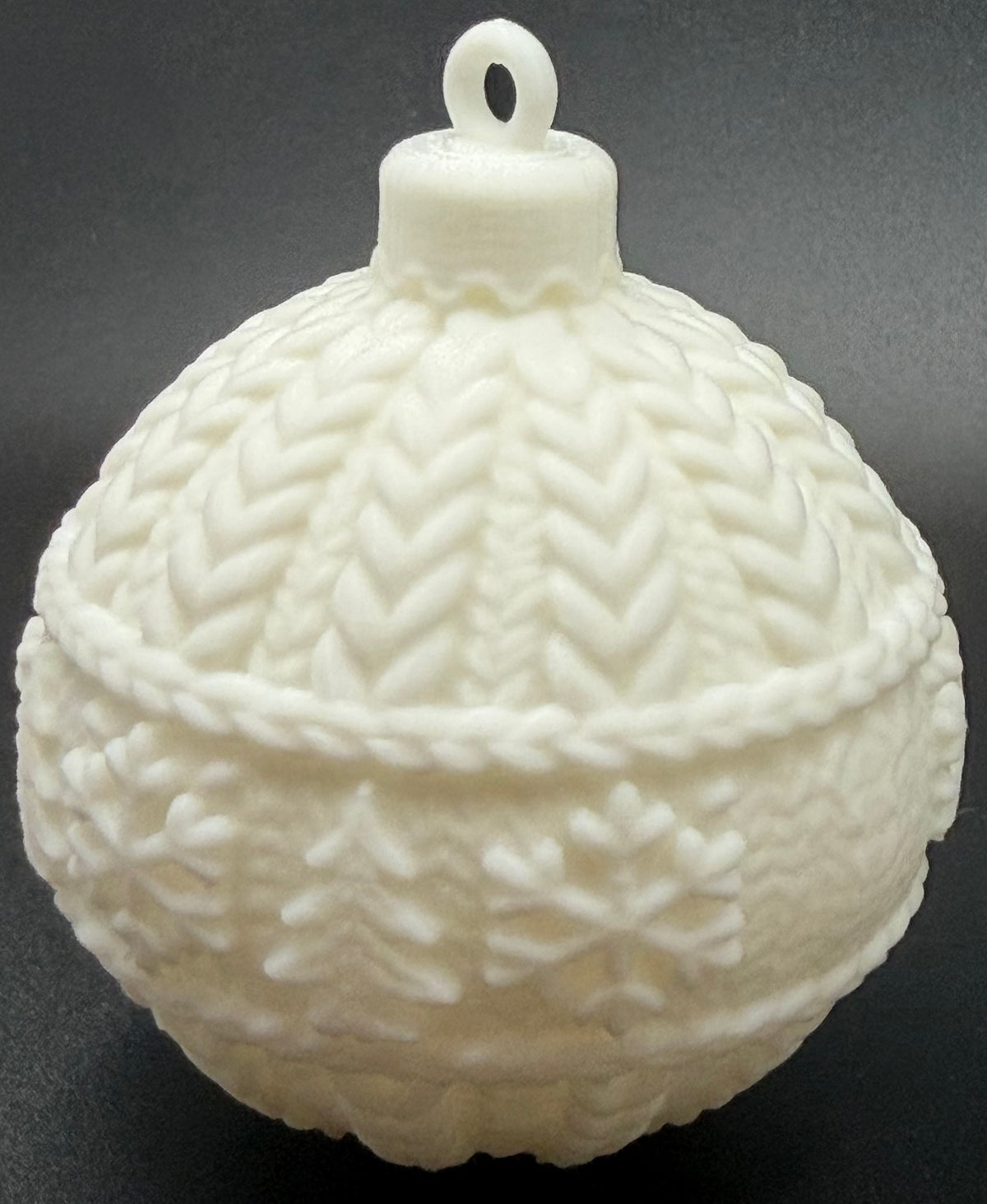White knitted-effect Christmas bauble, side view