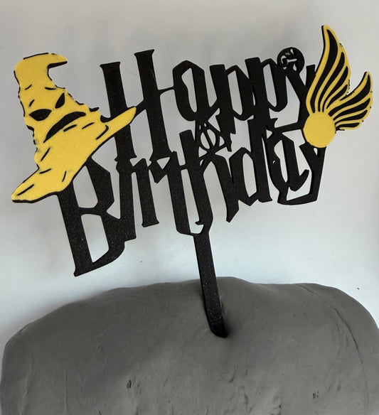 Black and gold wizard Happy Birthday cake topper with wizard hat and winged golden ball
